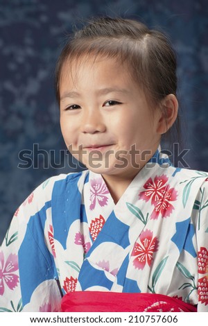 Half Body Portrait Of A Smiling Girl In Yukata