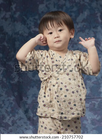 Half Body Portrait Of 2 Year-Old Kid In Jinbei