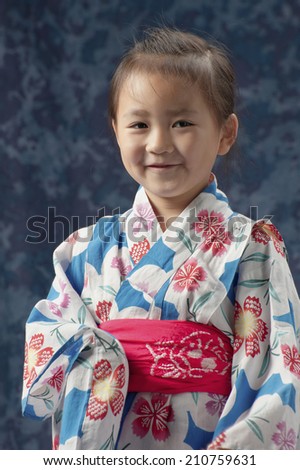 Half Body Portrait Of A Smiling Girl In Yukata