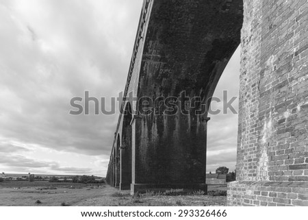 Under one of the 82 arches of Harringworth viaduct,showing the size and scale of this wonderful structure in Black and White, Harringworth, Northamptonshire, England.