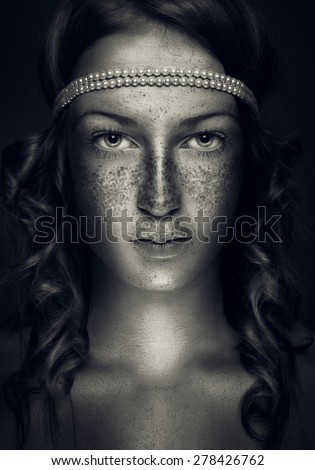 Beautiful portrait with freckles on the face, beauty portrait