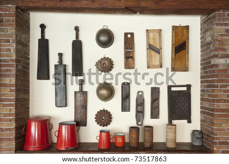 Old-time household items hanging on the wall