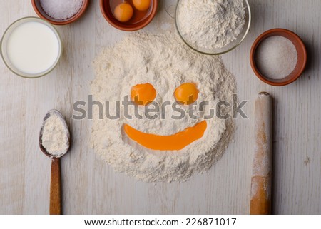 flour, eggs, milk, salt, baking ingredients on a table