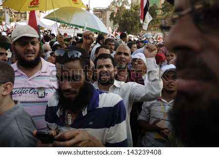 CAIRO - JUNE 21: Islamist supporters gather in Rabaa el-Adawia Square in Nasr City, Cairo to support the president Muhammed Morsi in the event titled \