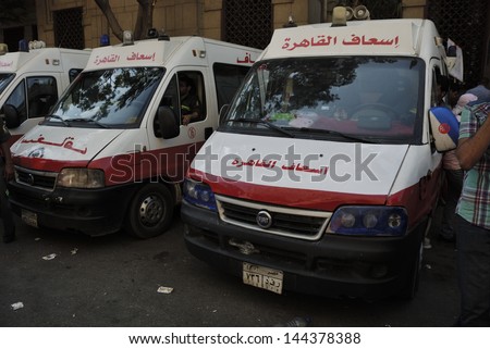 CAIRO - JUNE 30: Ambulance vans near Tahrir Square ready for emergency during the anti Muslim Brotherhood/Morsi protests in the Square on June 30, 2013 in Cairo, Egypt