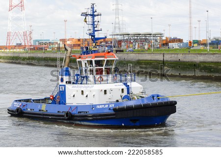 ANTWERP, BELGIUM - JULY 3: Tugboat Fairplay XIV in the port of Antwerp on July 3, 2011 in Belgium.