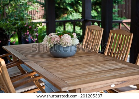A vase of flowers on the table