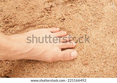 foot on sand floor
