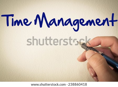 Time management text  write on wall