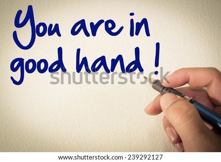 You are in good hand text write on wall