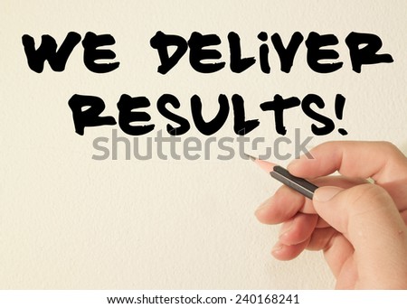 we deliver results text write on wall