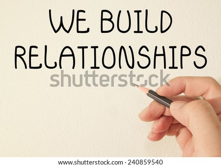 we build relationships text write on wall