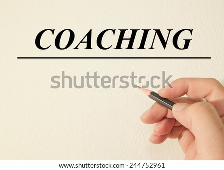 coaching text concept write on wall paper