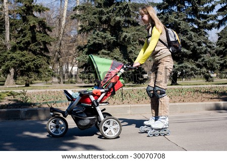Le bistrot est ouvert - Page 22 Stock-photo-young-mother-on-roller-skates-with-baby-carriage-30070708
