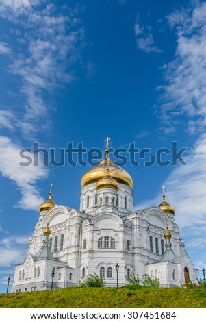 Belogorsky Cathedral. Russian Orthodox Church covered with gold, under blue skies. Closely resembles Christ the Savior Cathedral in Moscow