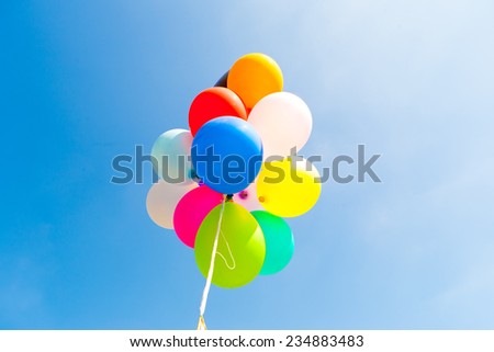 Bunch of colorful balloons in  sky