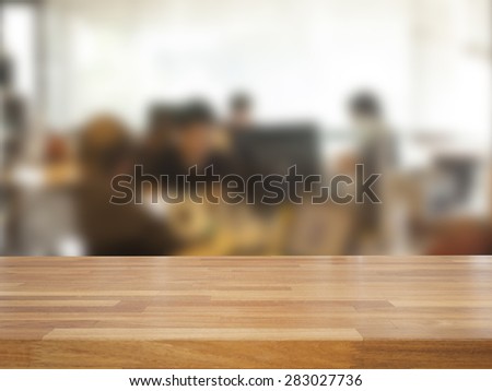 Empty wooden table and blurred business people background,product display