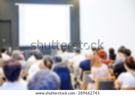 Blurred background of Business conference and presentation. audience at the conference room