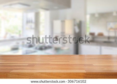 Empty wooden table and blurred kitchen background, product  montage display
