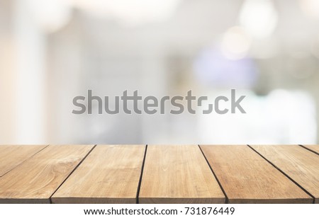 Empty wooden table and interior background, product display, blurred light interior background with bokeh, Ready for product montage