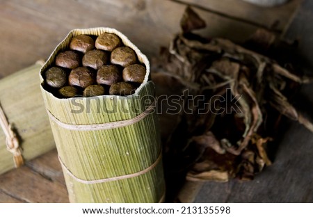Typical Cubano cigars. In a fabric in Cuba, real Cubano cigars are handmade by people using the best tobacco quality, hand rolled with special care and attention.
