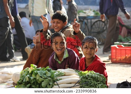 Pushkar, India, November 28 2012: Indian children smiling. Beautiful image of happiness of child in India