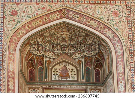 JAIPUR, INDIA - NOV 30: Close up of the arched door of the Facade of the Ganesh Pol building inside the Amber Fort, the main touristic attraction in Jaipur, on November 30 2012.
