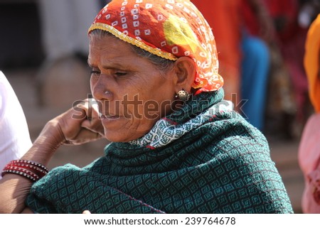 PUSHKAR, INDIA - NOV 29 2012: Portrait of an old Indian woman in the streets of Pushkar on november 29 2012
