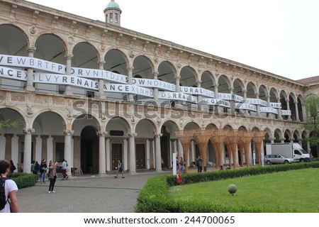 MILAN, ITALY - APR 8: University of Milan courtyard during the Milan Furniture fair on April 8 2014, with design installation all around