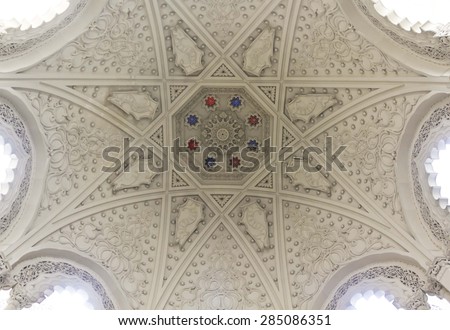 REGGELLO, ITALY - MAY 2 2015: Close up of the white ceiling inside the white room of Sammezzano Castle in Tuscany, Italy, typical of Moroccan Style