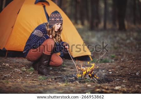 Couple tent camping in the wilderness