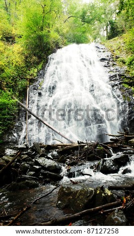 vertical panorama of a mountain waterfall
