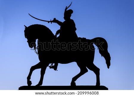 ZAGREB, CROATIA - AUGUST 08, 2014: Ban Josip Jelacic and horse silhouette in morning sky on the main square in Zagreb, Croatia