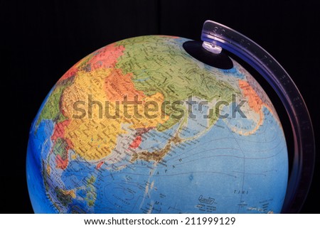 ZAGREB, CROATIA - AUGUST 15, 2014: Light globe with close up China and Japan