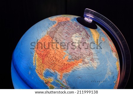ZAGREB, CROATIA - AUGUST 15, 2014: Light globe with close up Canada and United States of America