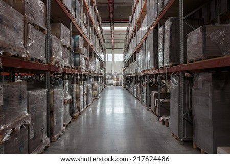 ZAGREB, CROATIA - SEPTEMBER 16, 2014: Printing house storage of goods in a modern warehouse. Large presses have a need for a continuous supply of materials needed for printing