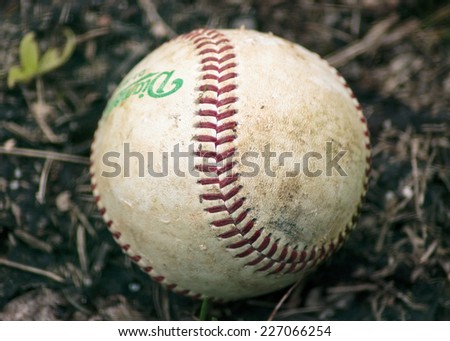ZAGREB. CROATIA - OCTOBER 04, 2014: Baseball match Baseball Club Zagreb in white jersey and Baseball Club Karlovac in grey jersey. Ball left on the ground during the game