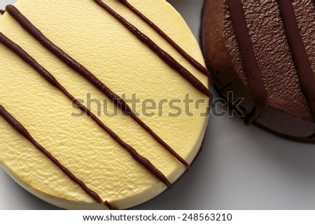 Vanilla and chocolate mousse cake close up