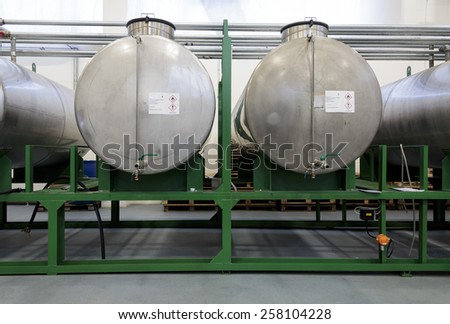 SVETA NEDELJA, CROATIA - FEBRUARY 02, 2015: Tanks in chemical factory containing isopropyl alcohol. Tanks are made of stainless steel.