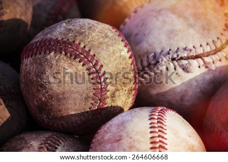 Old baseball balls close up background.  Post processed with vintage filter.
