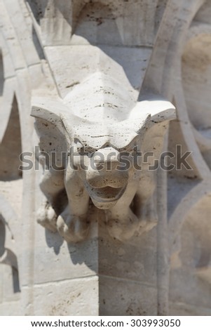 Gargoyle on church. Gargoyles are church signs. Telling people that this is the kind of bad spirits and monsters you may run into outside the church, and you\'re safe inside the church.