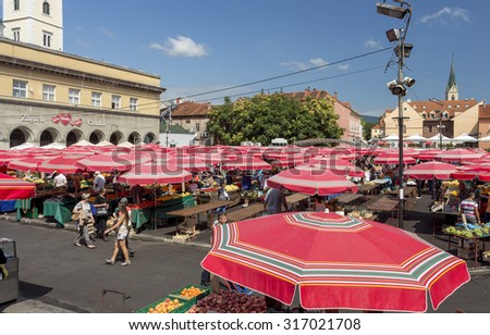 ZAGREB, CROATIA - AUGUST 26, 2015: Customers and sellers at Dolac, the famous open air farmer\'s market of agricultural products in Zagreb, one of city\'s most notable landmarks.