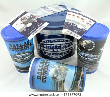FRISCO, TX - FEB 6, 2014: Dallas Cowboys football hologram drink cups, popcorn bucket, parking pass and tickets from the last season in Texas Stadium. Stadium was imploded on 4/11/2010.