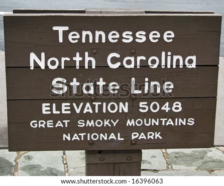 Sign in the Great Smoky Mountains indicating the North Carolina and Tennessee state lines.