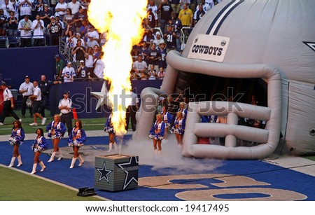 DALLAS - OCT 5: Texas Stadium Irving, Texas Sunday, October 5, 2008. Dallas Cowboys cheerleaders enter field to pyrotechnics. The last season that the Cowboys will play in Texas Stadium.