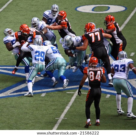 DALLAS - OCT 5: Texas Stadium on Sunday, October 5, 2008. The Dallas Cowboys defense tackles the Cincinnati Bengals runner. The last season that they will play in this stadium.