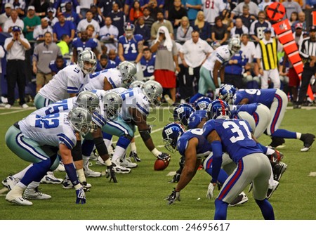 DALLAS - DEC 14: Dallas Cowboys Quarterback Tony Romo waits for the snap from the center during a game held Dec. 14, 2008 in Texas Stadium, Dallas, Texas.