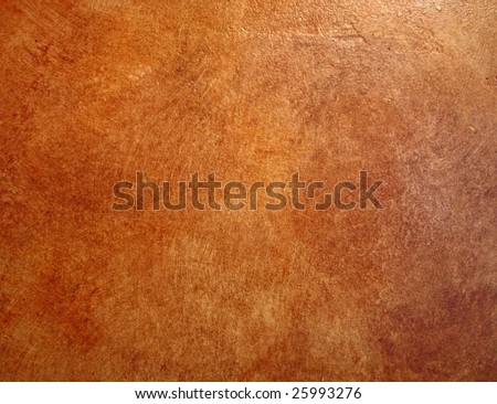 A red leather faux finish background wall.