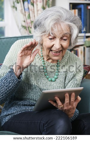 Senior Woman Making Video Call Using Digital Tablet