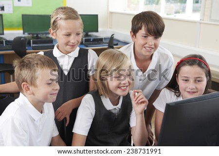 Group Of Elementary School Pupils In Computer Class
